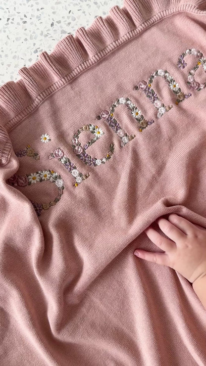 Floral embroidered ruffle blanket- Large font